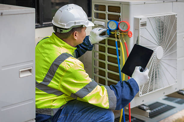 Professional Ac Installation technician working in Harveysburg, OH
